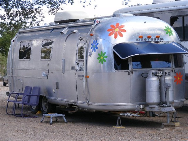 Let the good times roll with Josephine, our Woodstock reminiscent 1969 model Airstream.