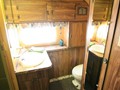 And a large full bath with 70's style paneling.