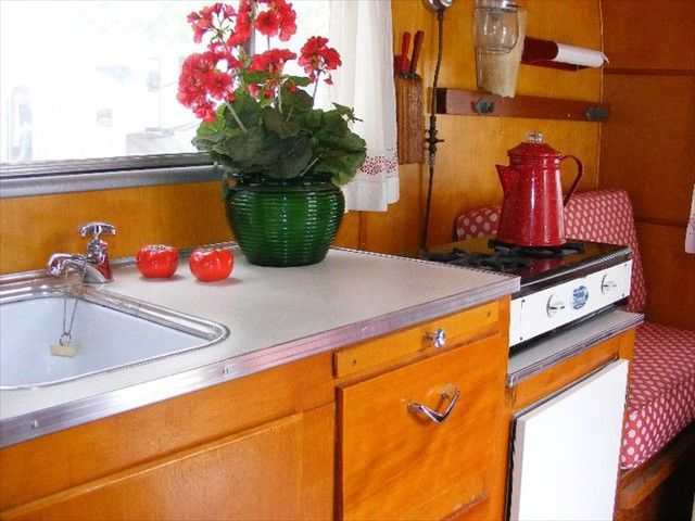 She has a charming little kitchen